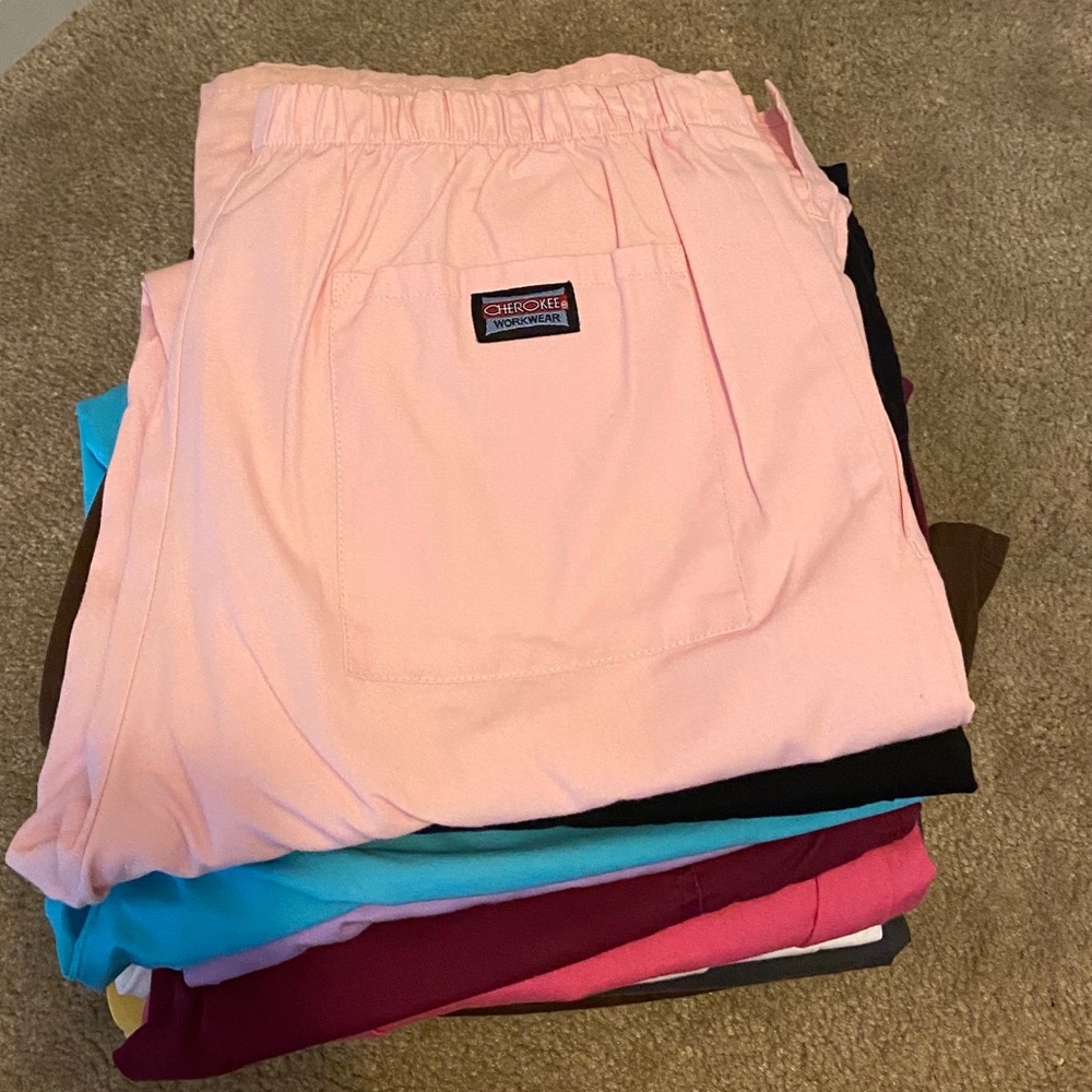 12 pair of size small Cherokee scrub pants